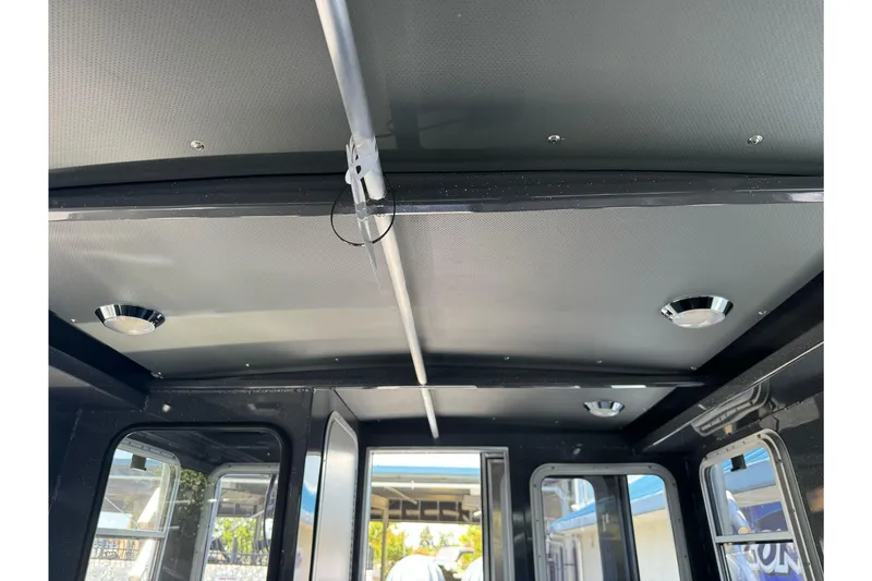 Slide: The Image of Interior view of 2026 Duckworth 28 Offshore boat cabin ceiling with lighting fixtures. - 49