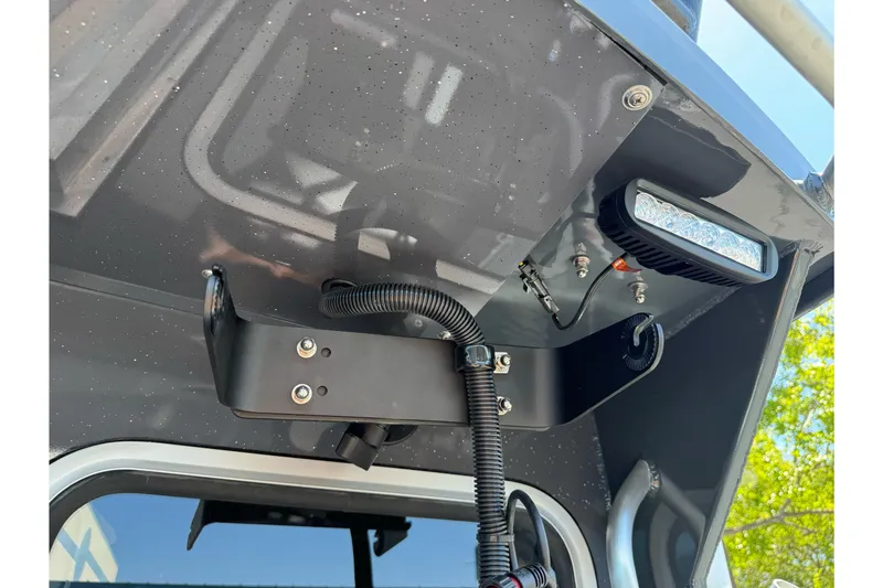 Slide: The Image of 2026 Duckworth 28 Offshore boat roof detail with mounted light and wiring. - 52