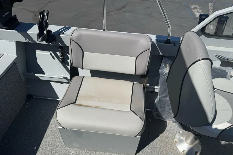 Slide: The Image of Boat interior with gray seating, KingFisher 16 Falcon, 2026 model. - 14