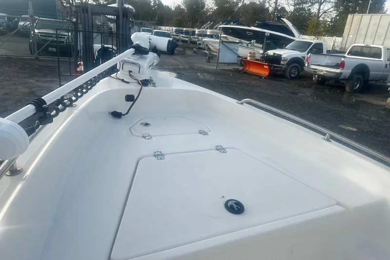 Slide: The Image of 2022 Key West 1720 Center Console boat in a storage yard. - 10