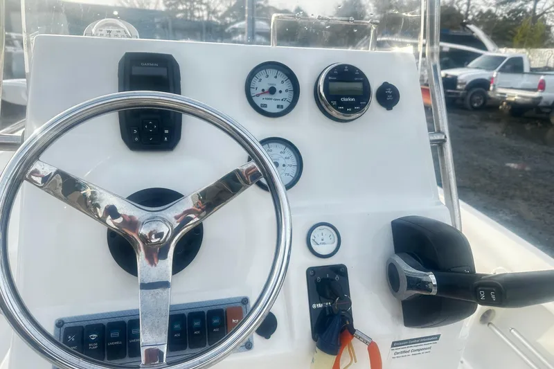 Slide: The Image of Center console of 2022 Key West 1720 boat with steering wheel and gauges. - 5