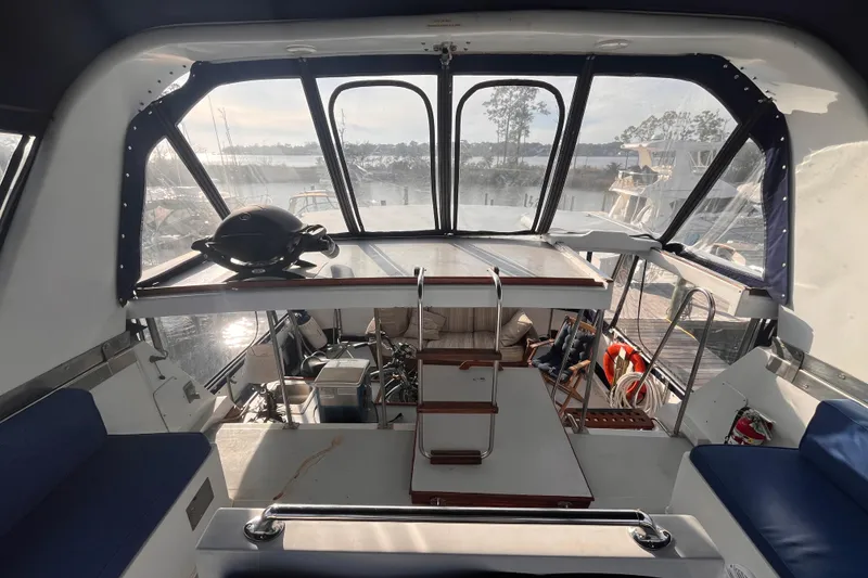 Slide: The Image of Interior view of 1986 Jefferson 42 SE Sundeck Motor Yacht with seating and helm. - 14