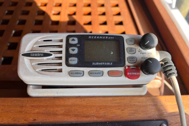 Slide: The Image of Uniden Oceanus DSC marine radio on 1986 Jefferson 42 SE Sundeck Motor Yacht. - 26