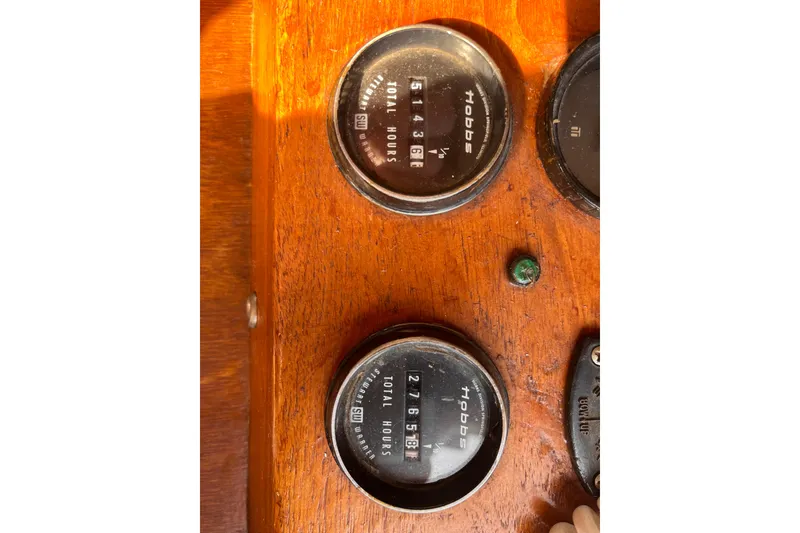 Slide: The Image of Close-up of hour meters on a 1986 Jefferson 42 SE Sundeck Motor Yacht dashboard. - 27