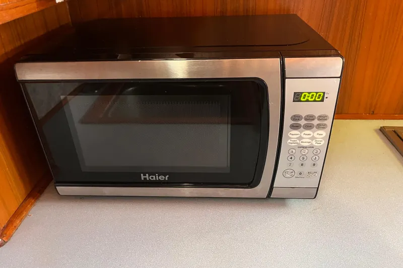 Slide: The Image of Haier microwave in 1986 Jefferson 42 SE Sundeck Motor Yacht kitchen. - 34