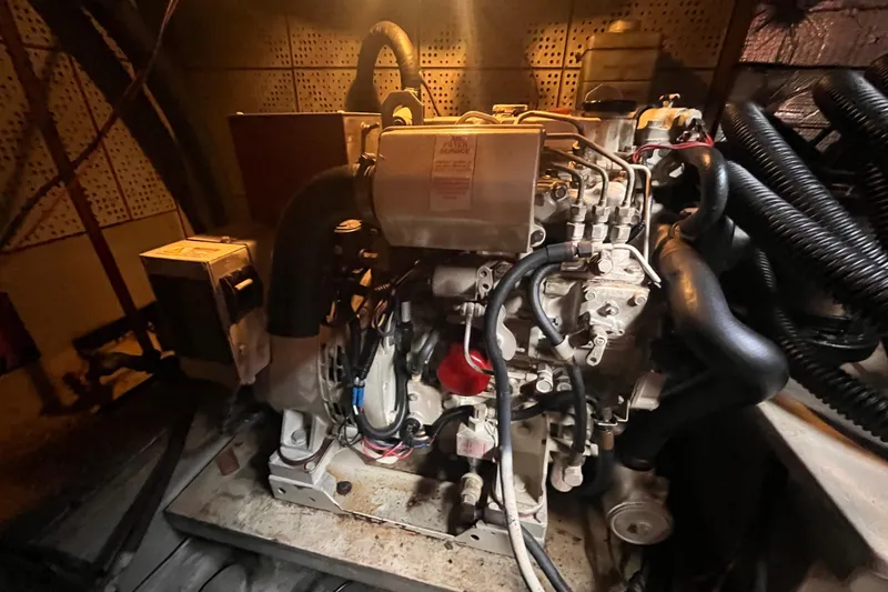 Slide: The Image of Engine room of a 1986 Jefferson 42 SE Sundeck Motor Yacht. - 58