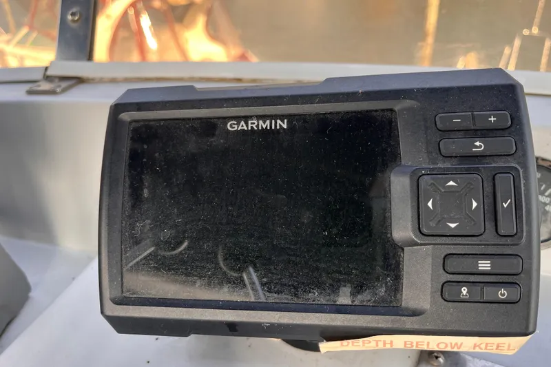 Slide: The Image of Garmin navigation device on 1986 Jefferson 42 SE Sundeck Motor Yacht dashboard. - 6