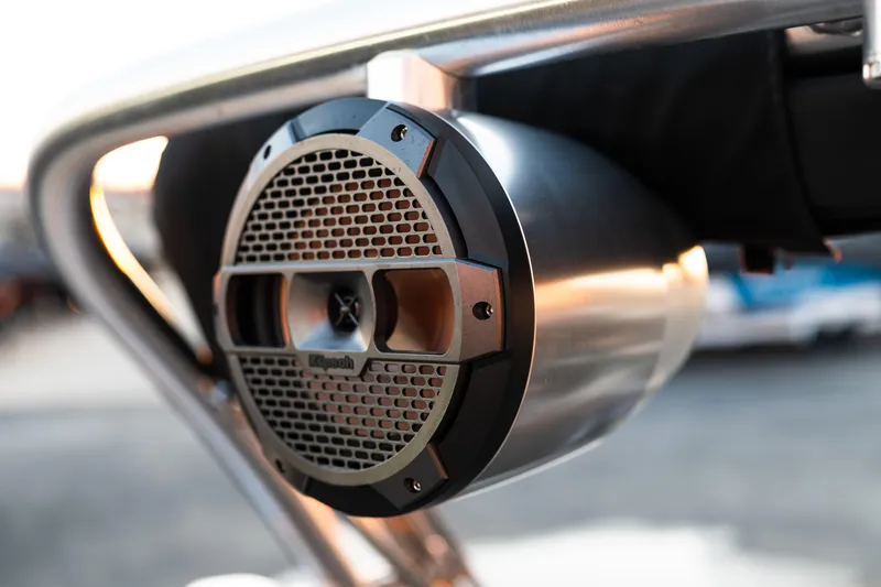 Slide: The Image of Close-up of a speaker on a 2022 MasterCraft XStar boat. - 13