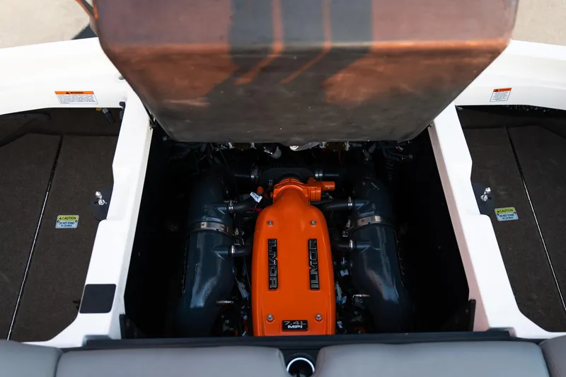Slide: The Image of 2022 MasterCraft XStar engine compartment with Ilmor 7.4L MPI engine. - 19