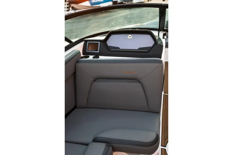 Slide: The Image of 2022 MasterCraft XStar interior with sleek gray seating and modern dashboard design. - 20