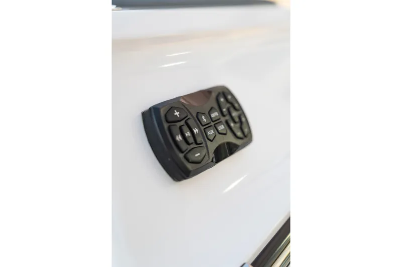 Slide: The Image of Control panel on 2022 MasterCraft XStar boat, featuring various function buttons. - 33