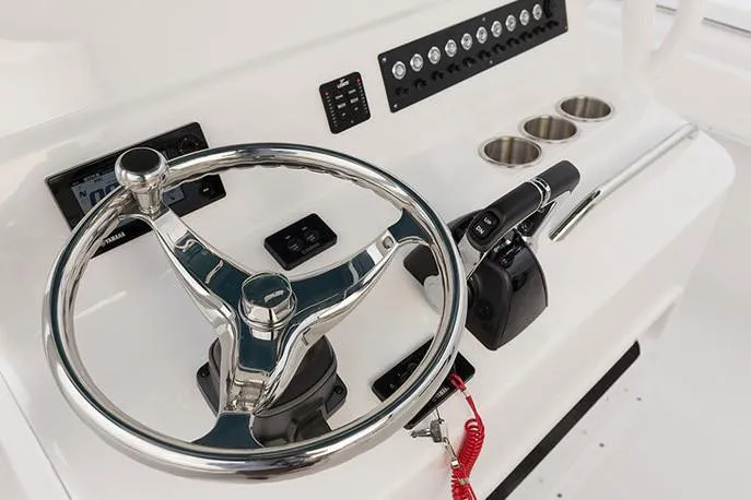 Slide: The Image of Manufacturer Provided Image: 2026 Cape Horn 31 T boat helm with steering wheel and control panel. - 11