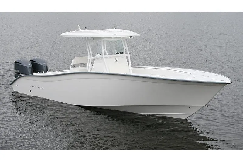 Slide: The Image of Manufacturer Provided Image: 2026 Cape Horn 31 T boat on calm water, featuring sleek design and dual engines. - 5