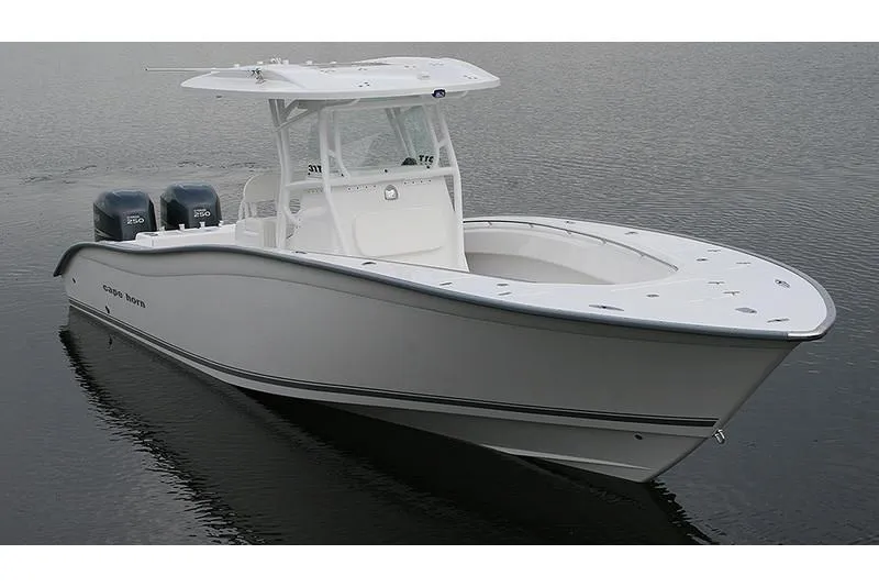 Slide: The Image of Manufacturer Provided Image: 2026 Cape Horn 31 T boat on calm water, featuring dual engines and sleek design. - 3