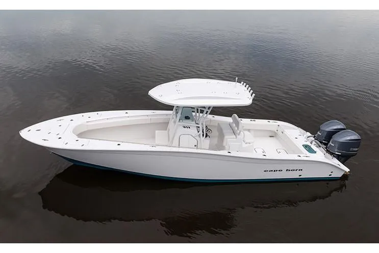 Slide: The Image of Manufacturer Provided Image: 2026 Cape Horn 31 T boat on calm water, featuring twin engines and sleek design. - 4