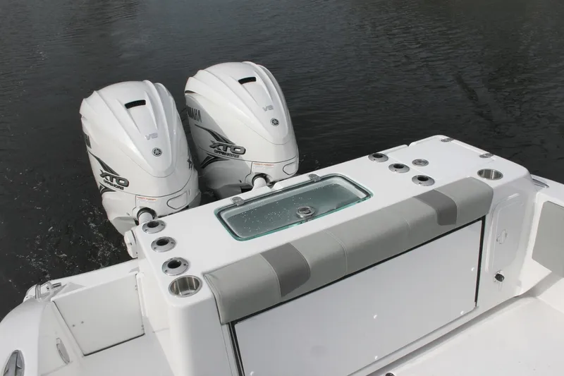 Slide: The Image of Manufacturer Provided Image: 2026 Cape Horn 34 XS boat with dual outboard engines on water. - 7