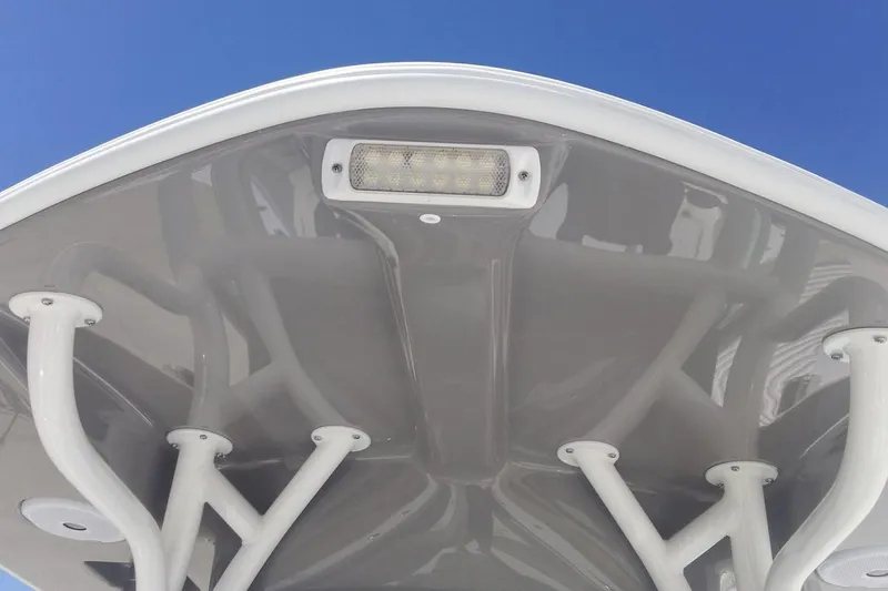 Slide: The Image of Manufacturer Provided Image: 2026 Cape Horn 34 XS boat canopy with LED light against clear blue sky. - 9