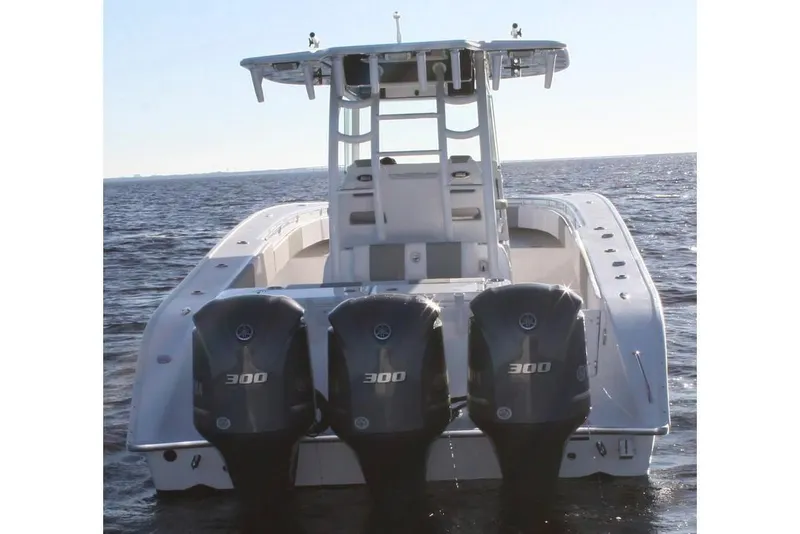 Slide: The Image of Manufacturer Provided Image: 2026 Cape Horn 36 XS boat with triple 300 horsepower engines on open water. - 5