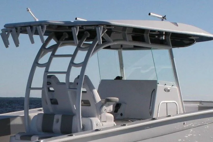 Slide: The Image of Manufacturer Provided Image: 2026 Cape Horn 36 XS boat with T-top and dual helm seats on open water. - 8