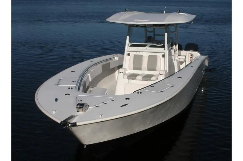 Slide: The Image of Manufacturer Provided Image: 2026 Cape Horn 36 XS boat on calm water, featuring sleek design and spacious deck. - 2