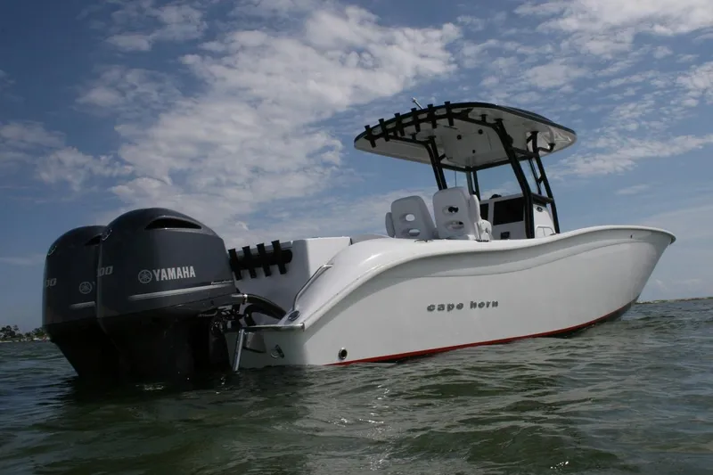 Slide: The Image of Manufacturer Provided Image: 2026 Cape Horn 32 T boat with dual Yamaha engines on water under blue sky. - 4