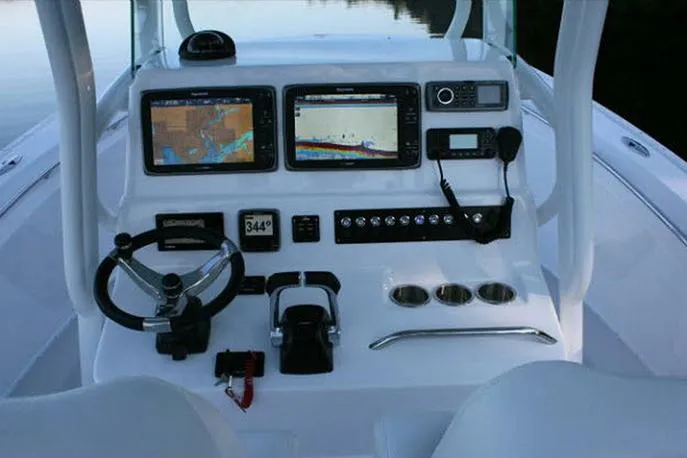 Slide: The Image of Manufacturer Provided Image: Cockpit of 2026 Cape Horn 32 T boat with advanced navigation and control systems. - 6