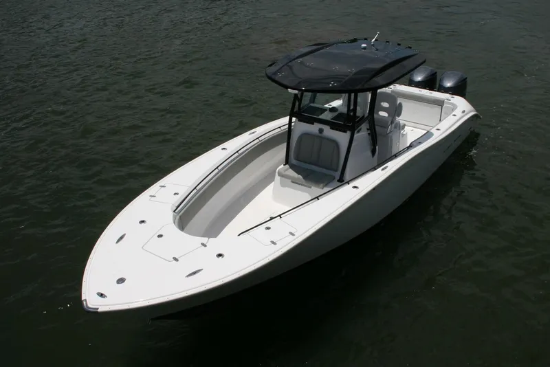 Slide: The Image of Manufacturer Provided Image: 2026 Cape Horn 32 T boat on water, featuring sleek design and dual engines. - 1