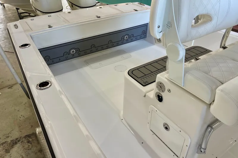 Slide: The Image of 2025 Ocean Master 296 Center Console boat interior with seating and storage features. - 30