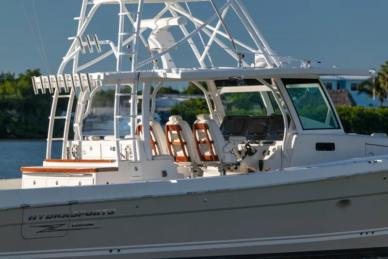 Slide: The Image of 2018 HCB 53 Suenos RXV boat with sleek design and advanced navigation equipment. - 19