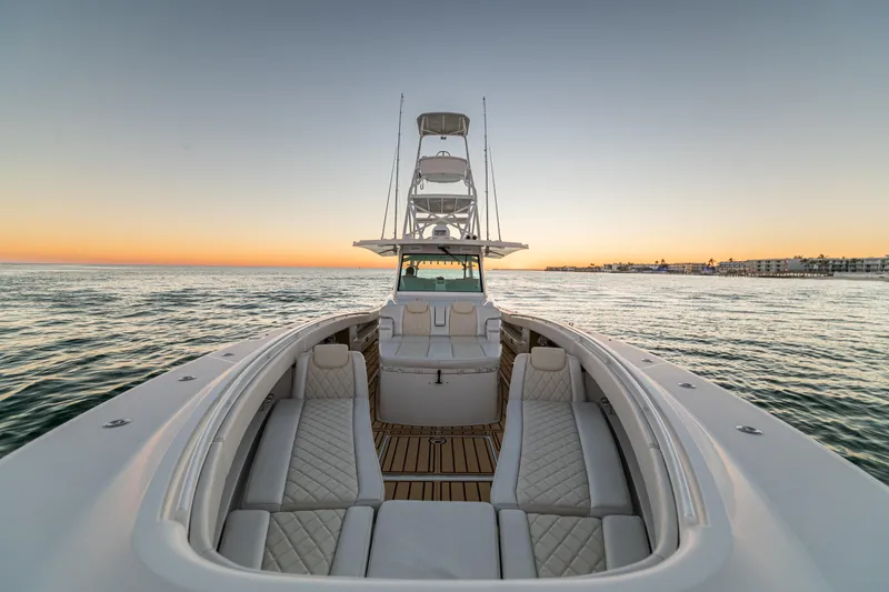 Slide: The Image of 2018 HCB 53 Suenos RXV yacht at sunset on calm waters. - 20