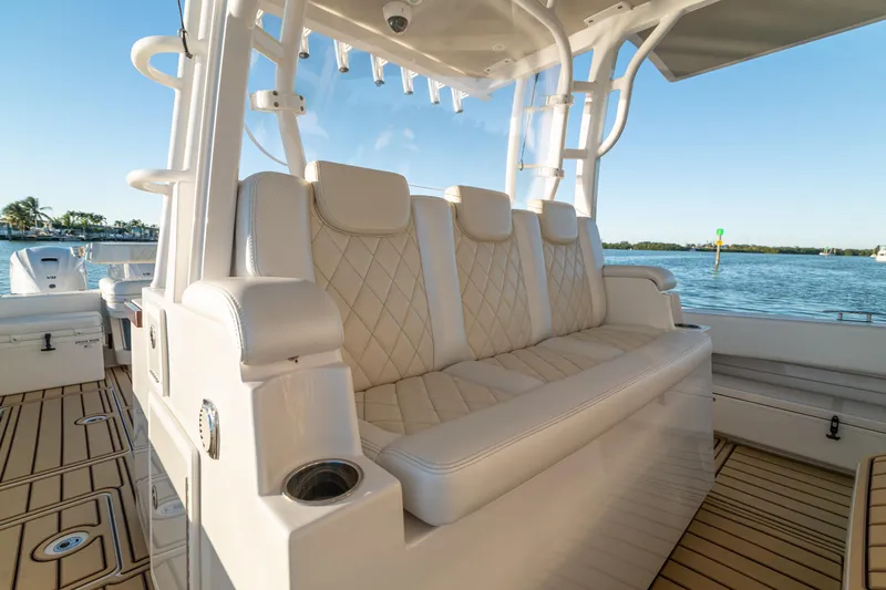 Slide: The Image of Luxurious seating on 2018 HCB 53 Suenos RXV boat with scenic water view. - 26