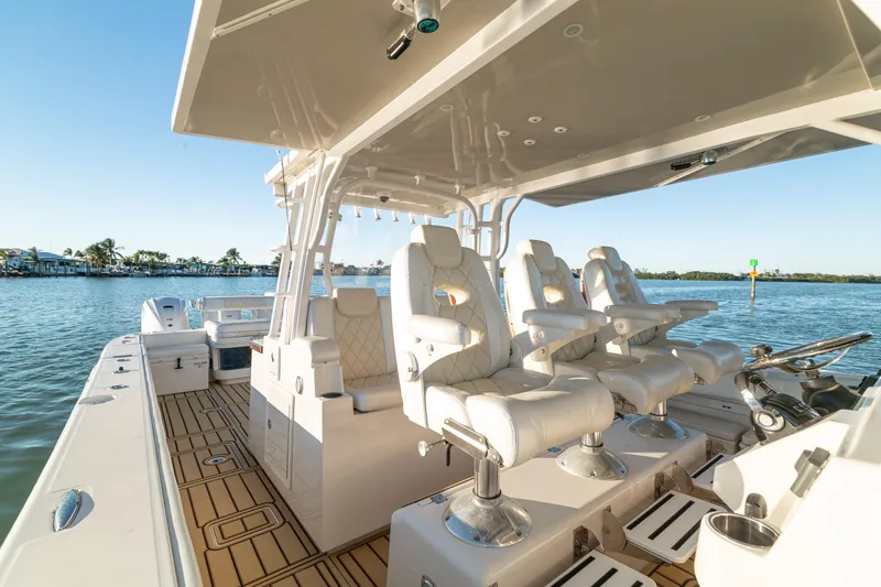 Slide: The Image of 2018 HCB 53 Suenos RXV boat interior with luxurious seating and ocean view. - 30