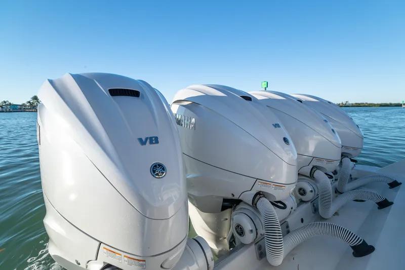 Slide: The Image of Four Yamaha V8 outboard engines on a 2018 HCB 53 Suenos RXV boat. - 36