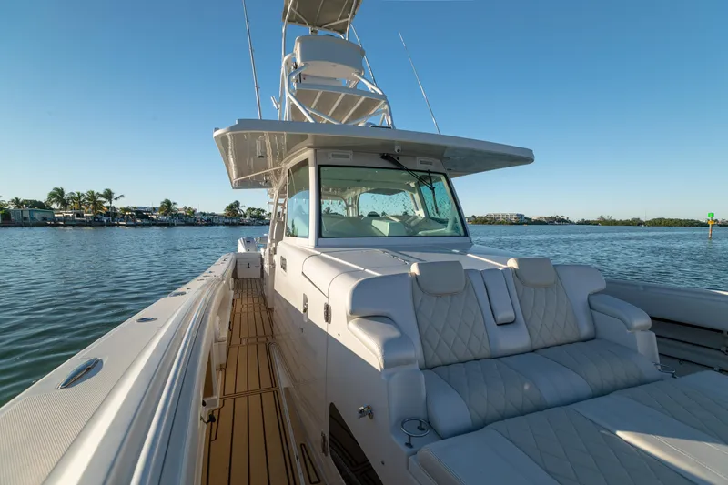 Slide: The Image of 2018 HCB 53 Suenos RXV luxury boat on calm water, sunny day. - 42