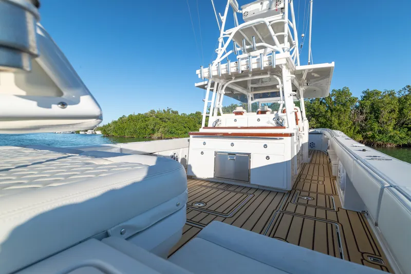 Slide: The Image of 2018 HCB 53 Suenos RXV boat with spacious deck and luxurious seating. - 45
