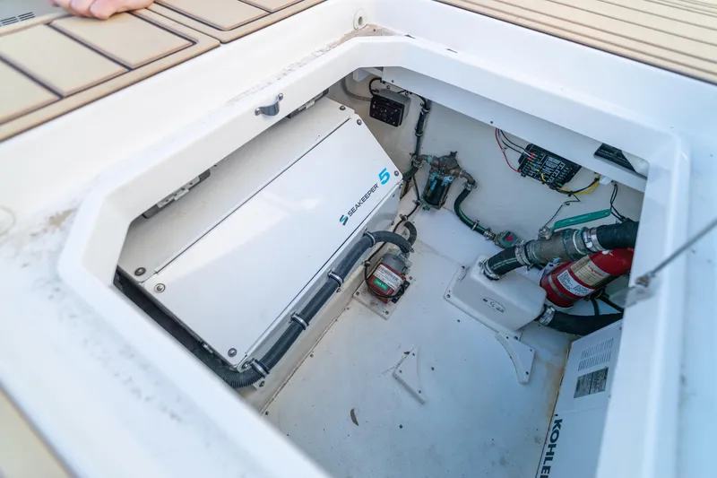 Slide: The Image of Engine compartment of 2018 HCB 53 Suenos RXV with Seakeeper 5 stabilizer. - 59