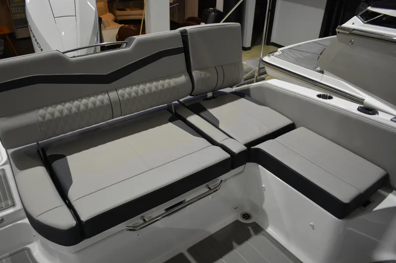 Slide: The Image of Luxurious seating on 2026 Monterey Elite 25 OB boat, featuring modern design and comfort. - 12