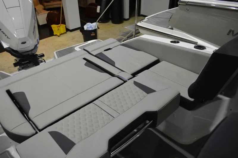 Slide: The Image of 2026 Monterey Elite 25 OB boat interior with luxurious seating and modern design. - 14