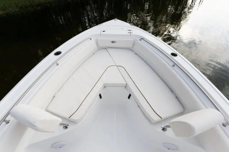 The Image of Manufacturer Provided Image: Bow seating area of 2026 Sea Hunt Ultra 239 SE boat, featuring white cushioned seats. - 4