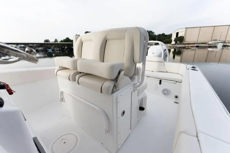 Slide: The Image of Manufacturer Provided Image: 2026 Sea Hunt Ultra 239 SE boat interior with comfortable seating and sleek design. - 7