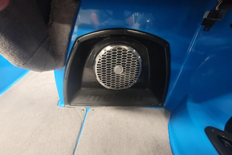 Slide: The Image of Speaker system in 2014 Malibu Wakesetter 24 MXZ boat interior, featuring blue and gray design. - 16