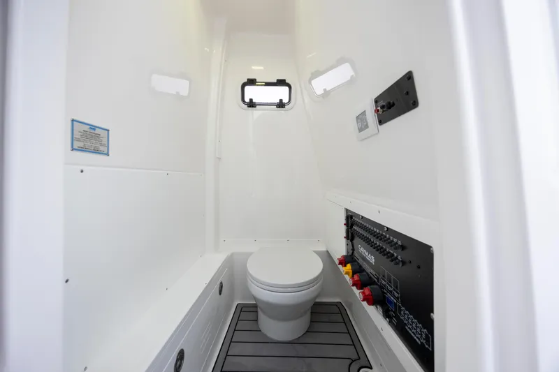 Slide: The Image of 2026 Caymas 291 boat interior with modern toilet and control panel. - 20