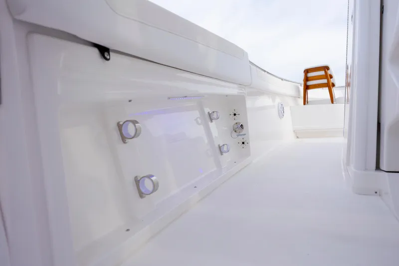 Slide: The Image of 2026 Caymas 291 boat interior with sleek white design and modern fixtures. - 38