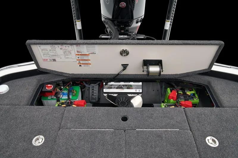 Slide: The Image of 2026 Ranger Z521R Cup-Equipped boat battery compartment with green lithium battery. - 54