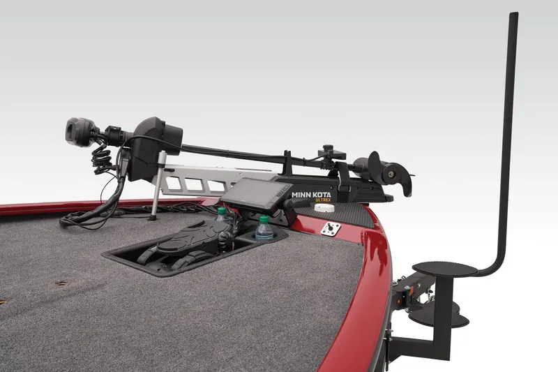 Slide: The Image of 2025 Tracker Savage 215 boat with powerful outboard motor and dual-axle trailer. - 12