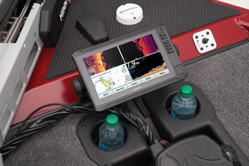 Slide: The Image of Minn Kota Maxxum trolling motor on 2025 Tracker Savage 215 boat deck. - 17