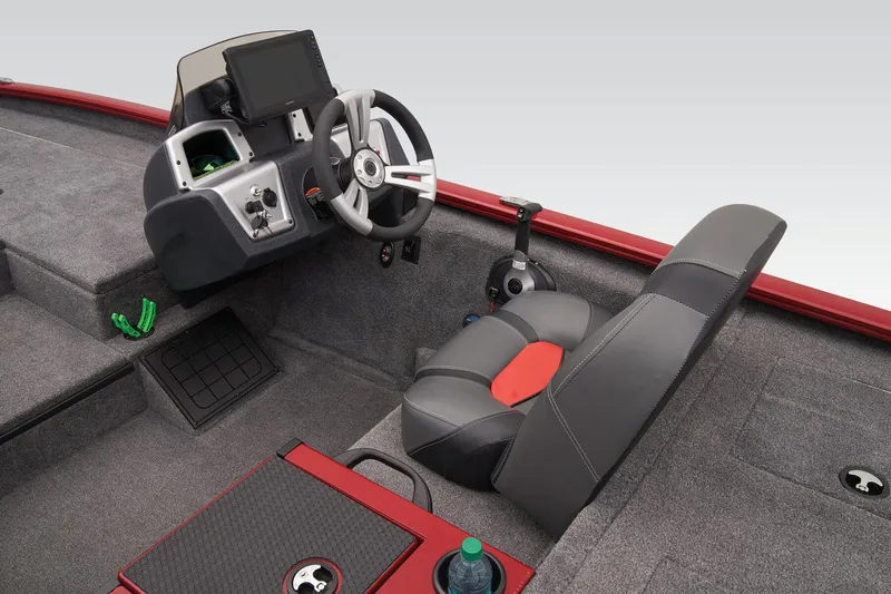 Slide: The Image of 2025 Tracker Savage 215 boat storage compartment with open lid, showcasing interior space. - 29