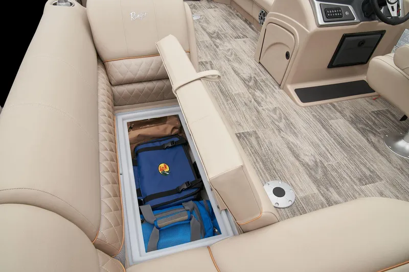 Slide: The Image of 2025 Ranger Reata 220FC boat interior storage compartment with sleek design and modern features. - 44