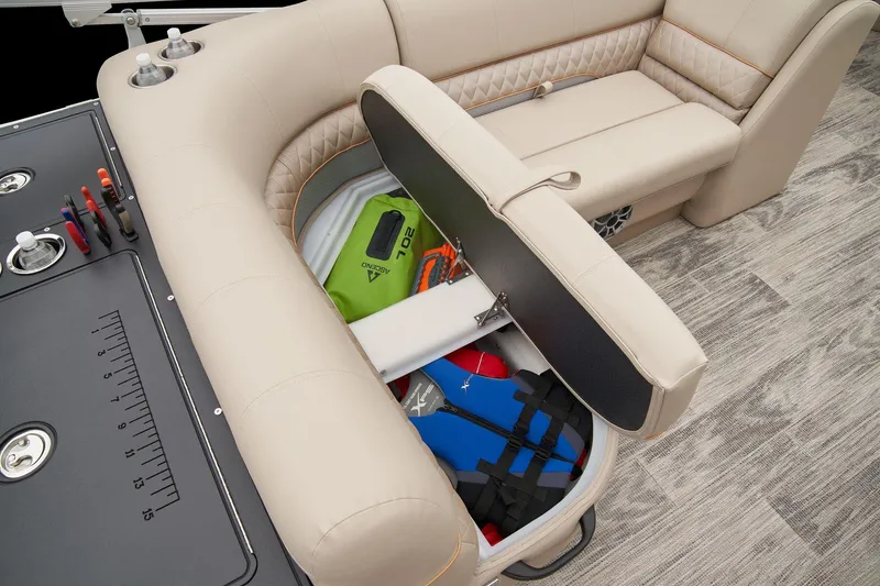 Slide: The Image of 2025 Ranger Reata 220FC boat interior with gray seating and wood-style flooring. - 45