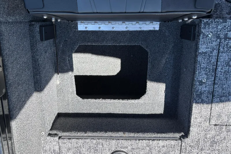Slide: The Image of Interior storage compartment of 2026 Tracker Targa V-18 Combo boat. - 16
